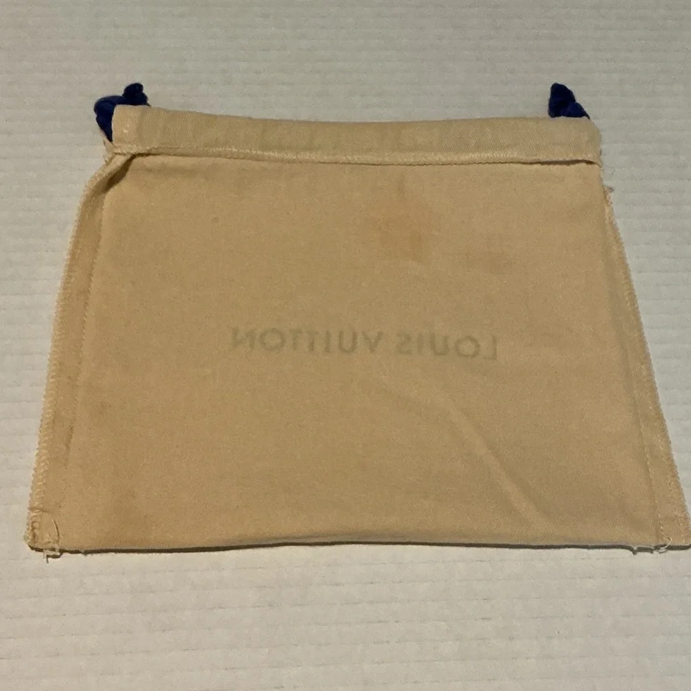 Authentic Louis Vuitton Cream empty bag with Blue Accents